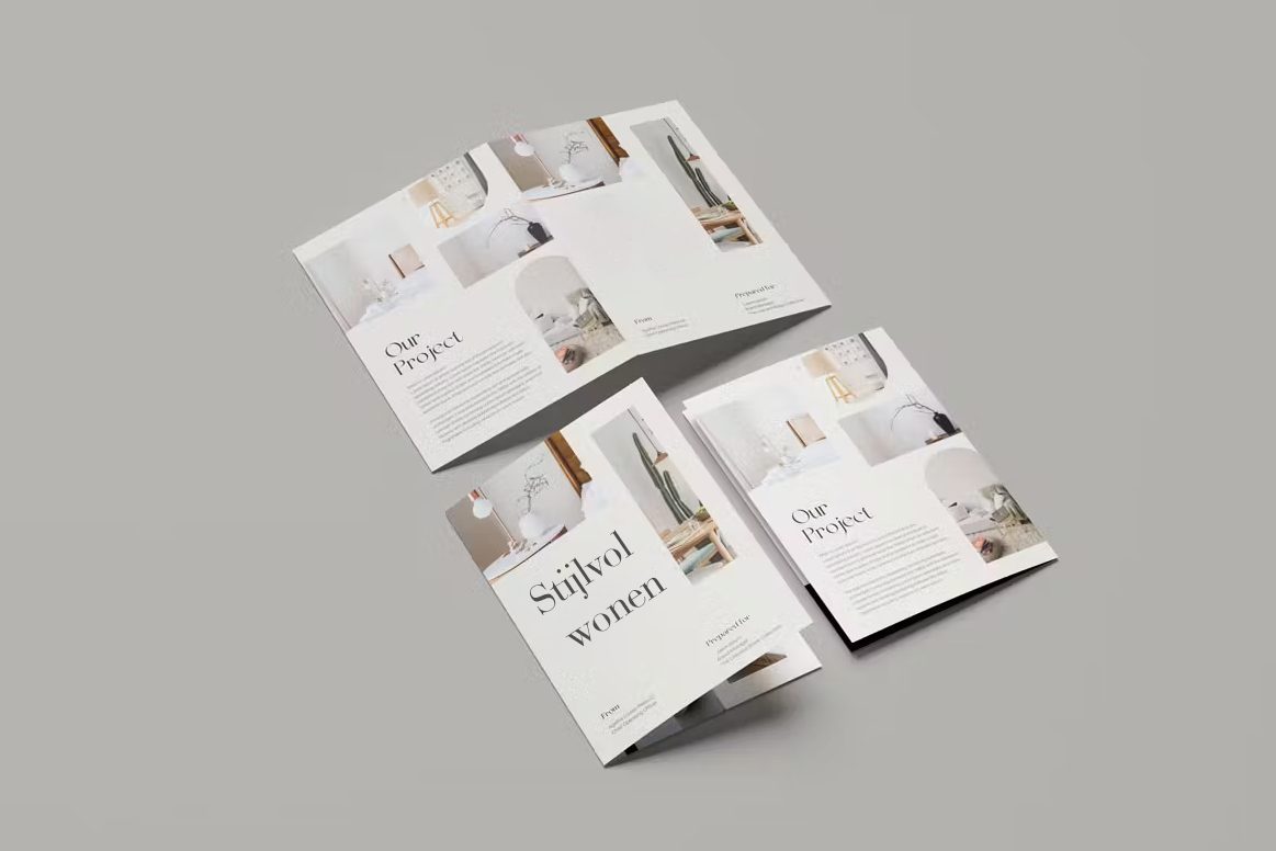 Gevouwen folders met woninginterieurs