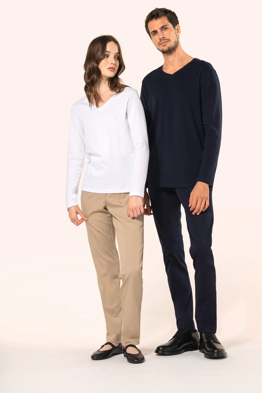 Woman in a white and man in a navy long-sleeved shirt